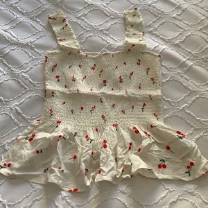 Elodie peplum white tank w/ cherry design. Size M